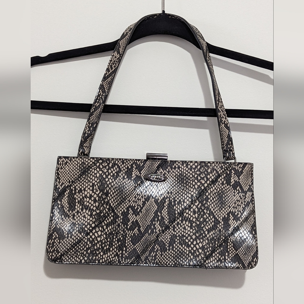 Guess hand held bag in snake skin print